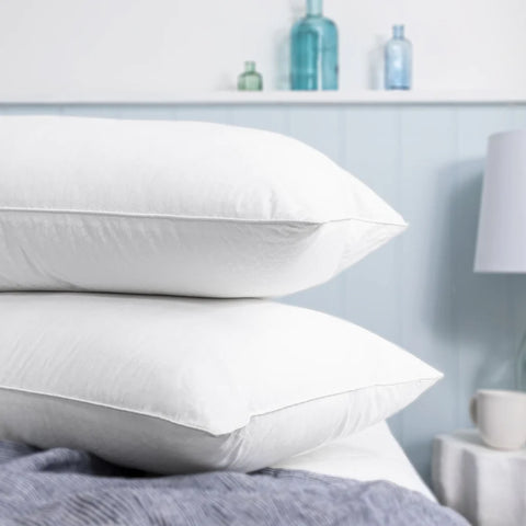 Two white Smart Temperature pillows. Temperature Control bedding for when you're too hot to sleep. 