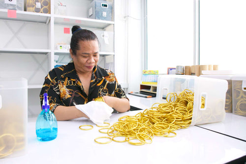 Artisan in Thailand Cleaning BuDhaGirl Gold All weather Bangles.