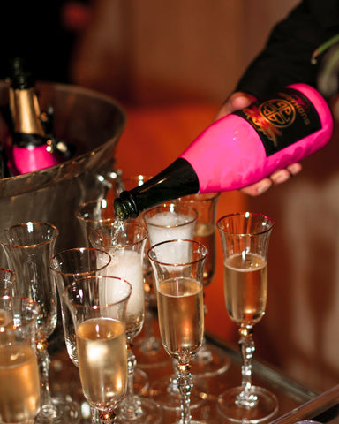 Waiter pouring the New BuDhaGirl Sparkling Wine