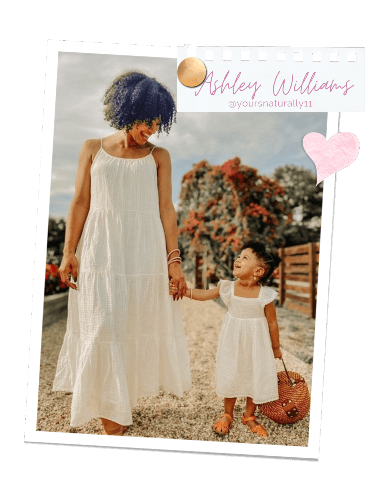 Ashley Williams holding her daughter's hand | BuDhaGirl