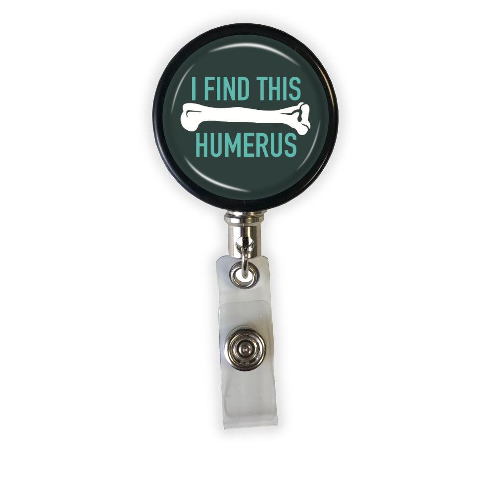 https://cdn.shopify.com/s/files/1/0088/9094/1476/products/i-find-this-humerus-badge-reel-370312_1600x.jpg?v=1615691181