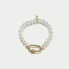 Wit/goudkleurige armband met parels en gouden sluiting