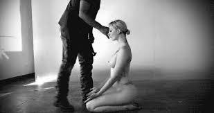 Submissive kneeling for her dominant