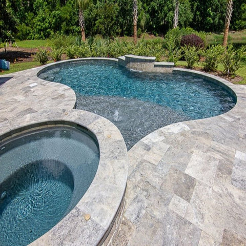 Silver travertine pavers and pool copings