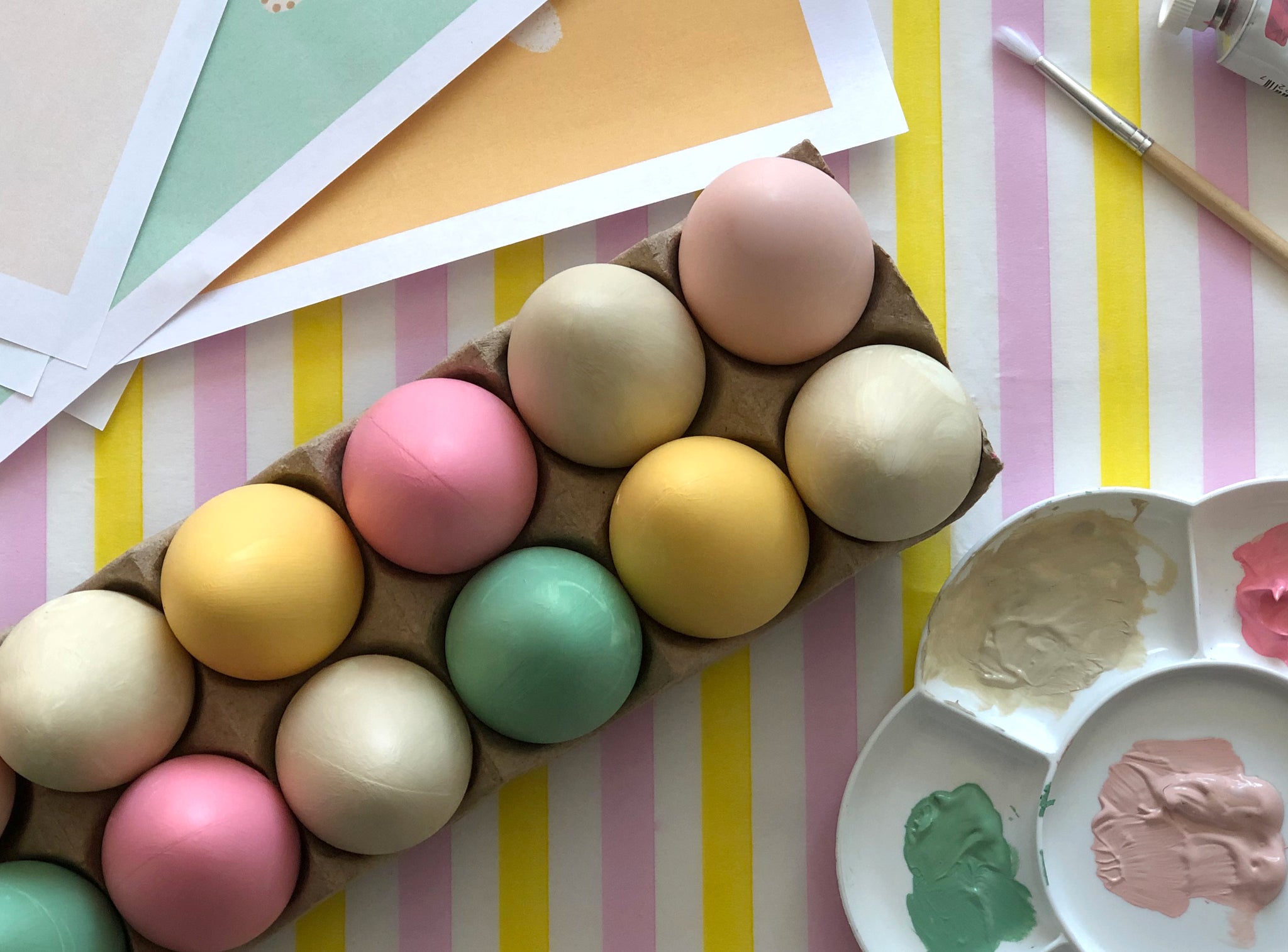 Various colour painted Easter egg crafts for kids