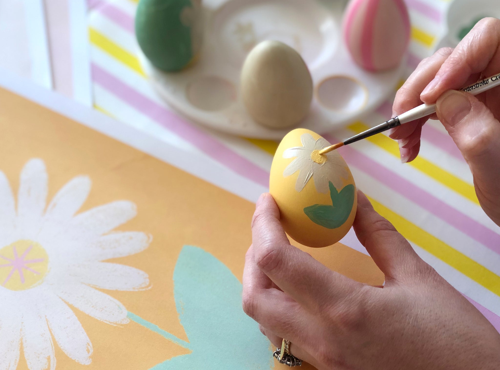 Painted daisy on Easter egg craft for kids