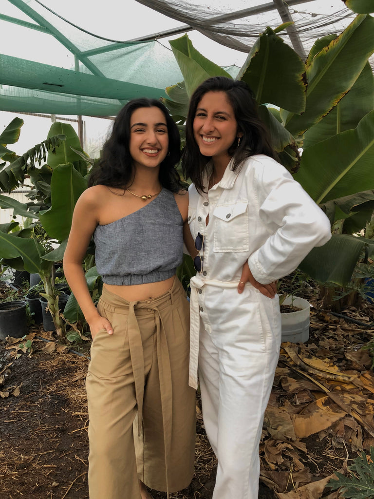 Diandra and Aditi visiting a farm when Diandra first visited California after co-founding IE.