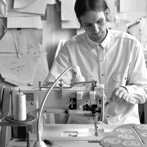 Edward De Lacy working on a leather product