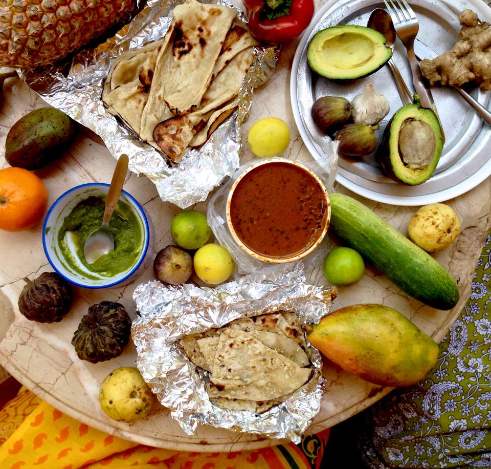 Colorful fruits and vegetables spread across a table