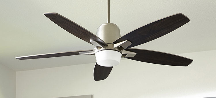 Mixed metal and wood ceiling fan.