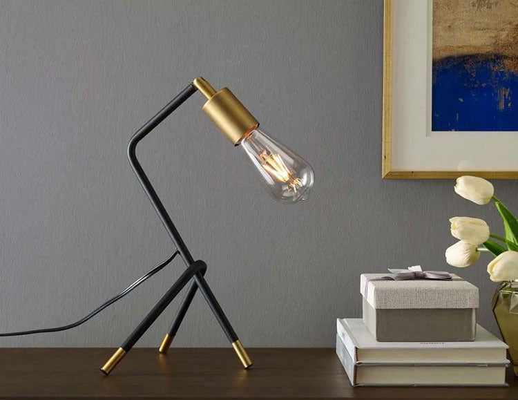 This Modway Achievement Table Lamp is an example of an Industrial style lamp.