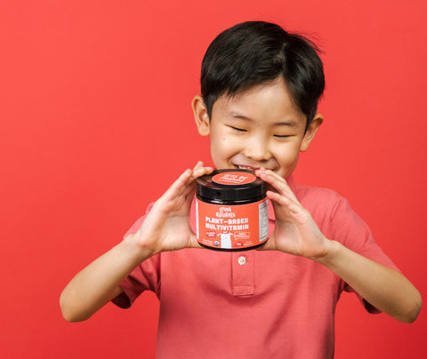 Boy looking at vitamins