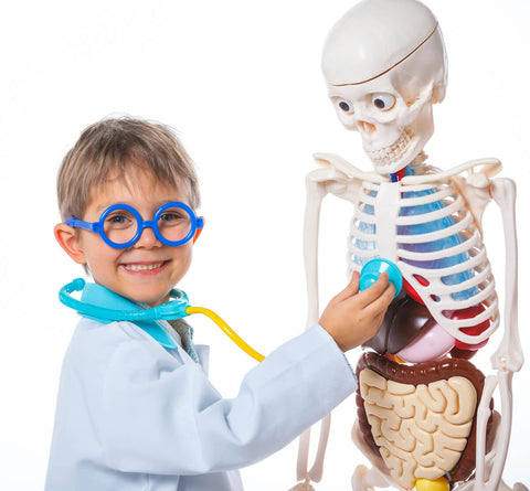 Boy playing a doctor