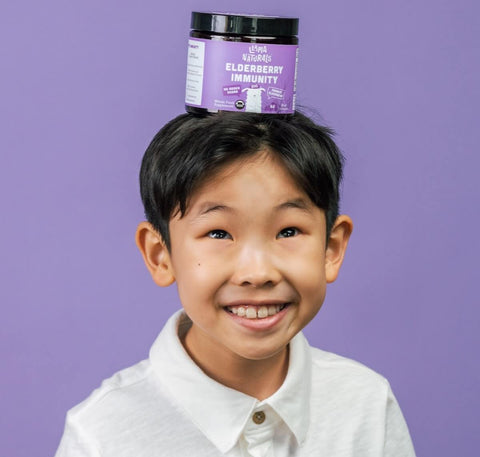 Boy with elderberry for kids on his head