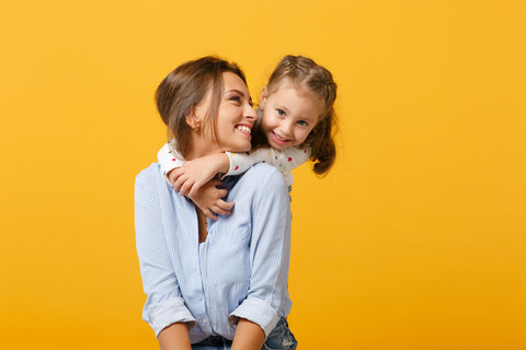 Iodine for kids: little girl hugging an adult woman