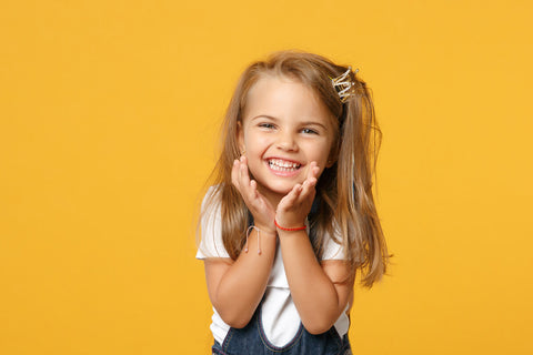 Vitamin B1 for kids: happy little girl