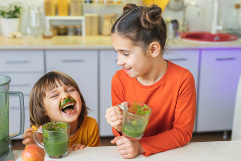 Nutrients for kids: kids drinking green smoothies