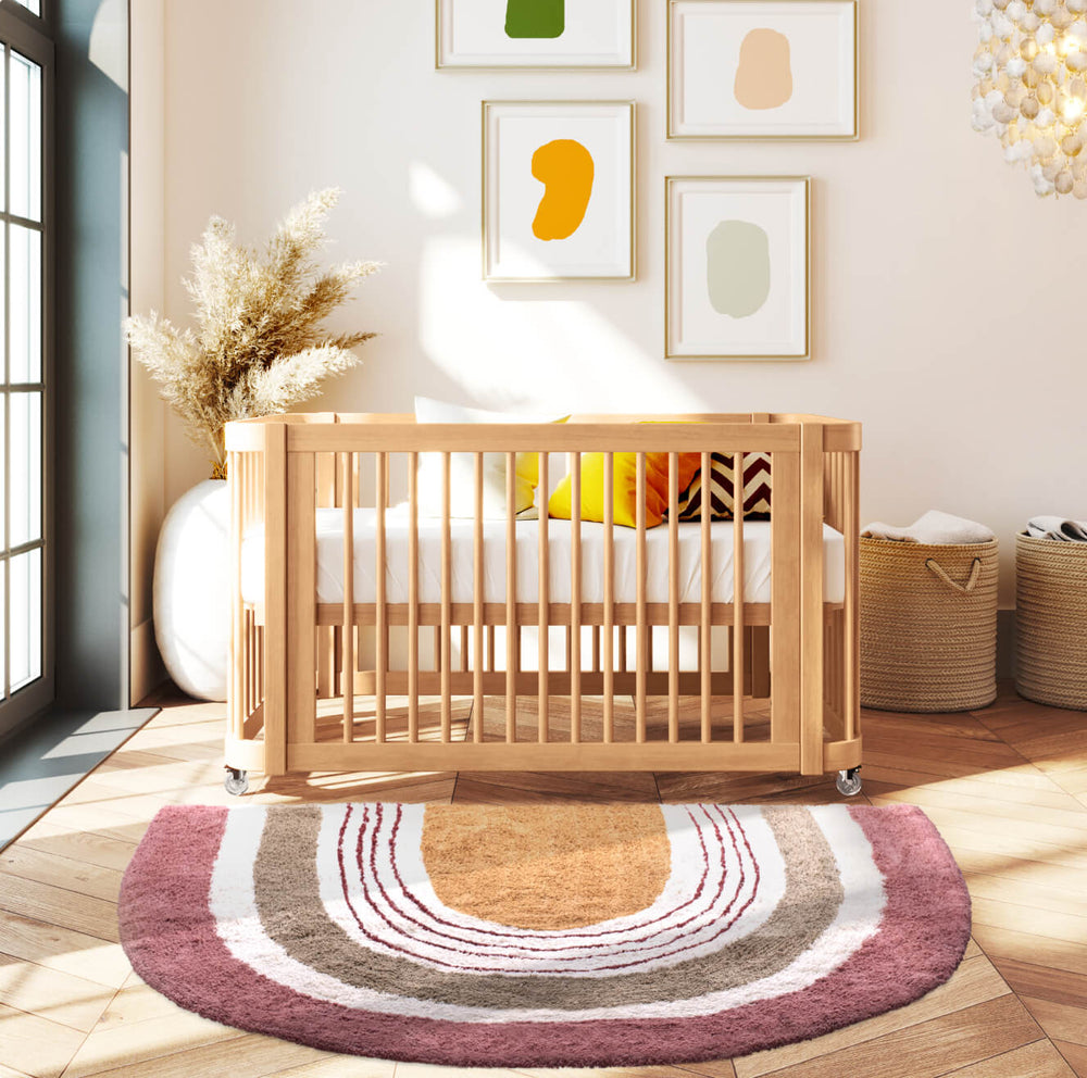 light colored wood crib