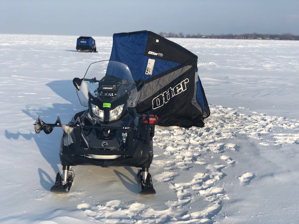 Half the fun of ice fishing on Lake Winnipeg is snowmobiling out to where  the big walleye live! Check out my setup here, my 1995 Skandic 500 sure  gets the job done! 