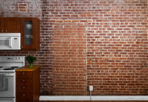 industrial homes with exposed brick wall