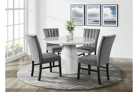 round dining table with velvet dining chairs