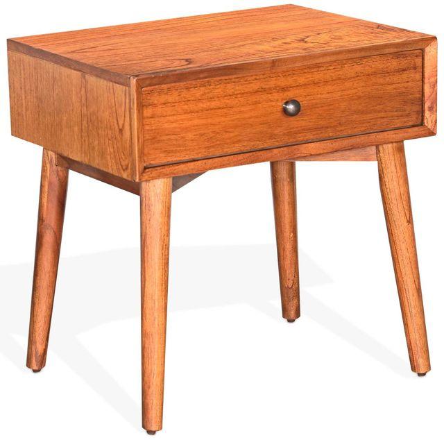 this is a light wood, mid-century modern nightstand. It has one simple drawer, and a burnished metal know. The legs are angled and tapered.