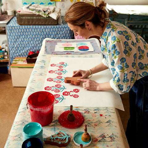 Molly Mahon block printing in her studio working on her collaboration designs with Boden