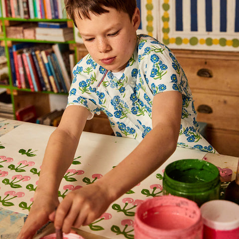 boy block printing for Mini Boden capsule collaboration launch in Molly Mahon's studio