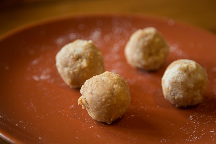 Roll the dough into four separate balls.