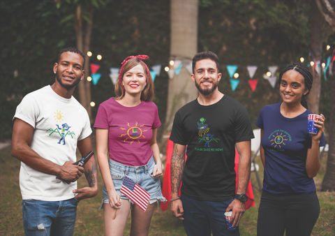 Four friends at outdoor celebration.