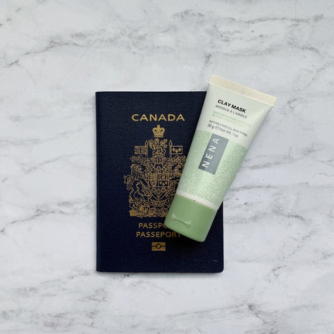 NENA Clay Mask 30 g tube flat lay with Canadian passport