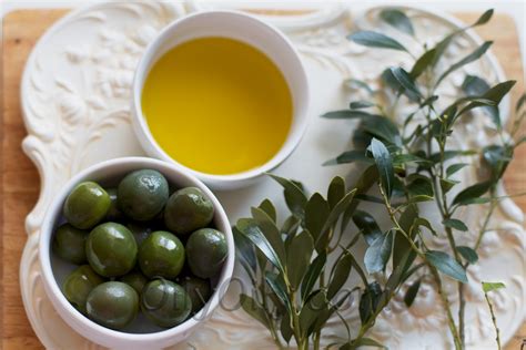 Ozonated olive oil and olives