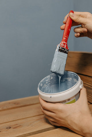 Rolla-wipa paint brush with lots of paint. Painting mistakes to avoid