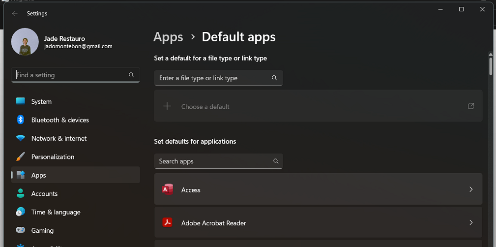 In the Default apps window, scroll down and click on