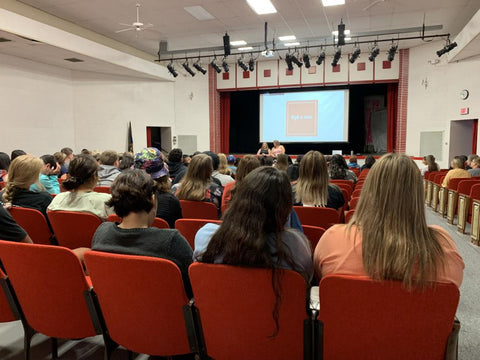 Students listen to lectures in the auditorium