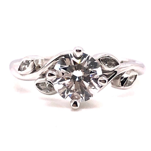 platinum prong set custom diamond engagement ring with marquise accent diamonds