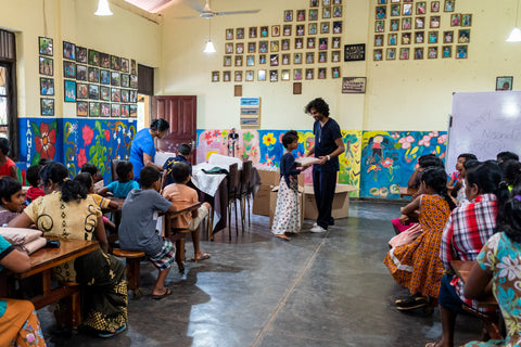 donation trip. orphanage. yellow walls. school.