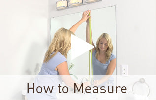 Preview of the how to measure video showing girl preparing to measure her plate glasss wall mirror.