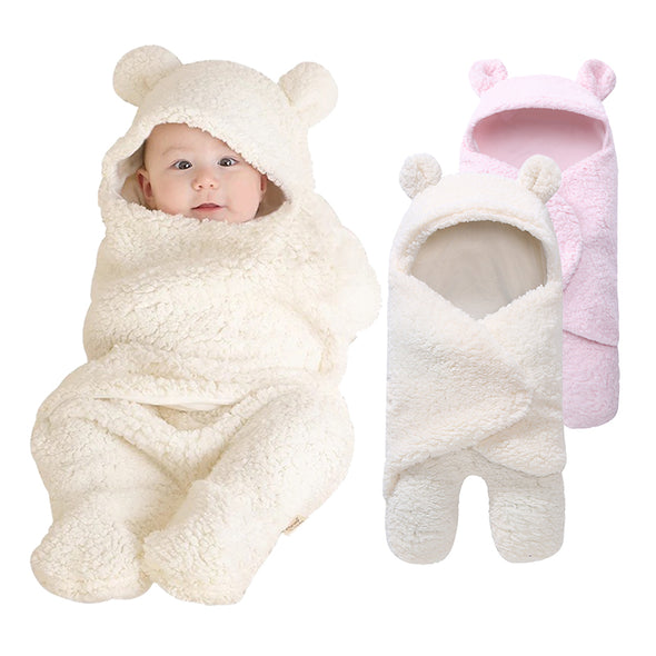 cute boy swaddles