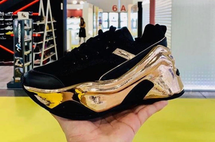 gold chunky trainers