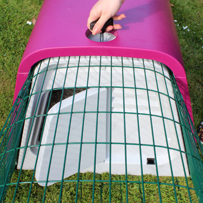 The Eglu Go hutch front door gives the option to shut pets in the house at night