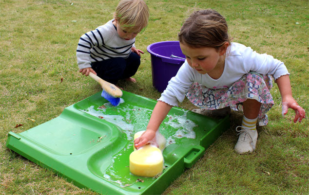 The Eglu Cube’s smooth plastic surfaces can be washed with a hose