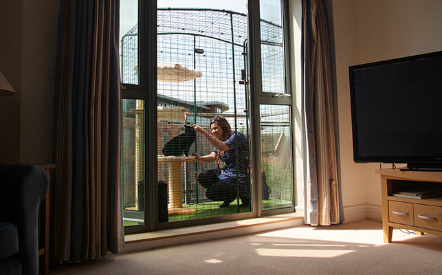 Every size of Cat Balcony Enclosure is also large enough for you to spend time outside with your cat.