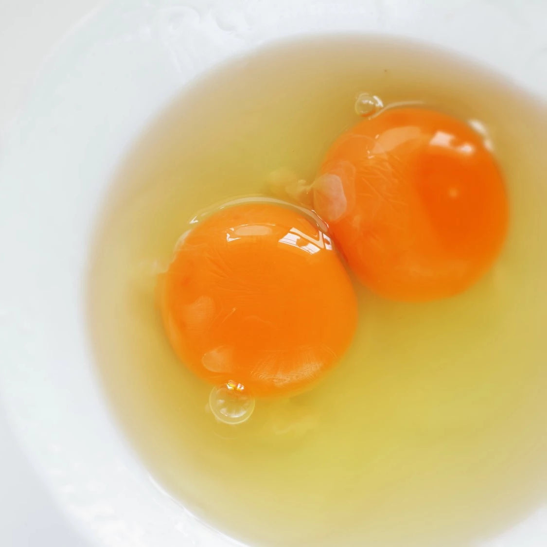 Double yolks occur when two eggs join together at the point they separate from the ovaries, or if a yolk essentially loses its way during formation