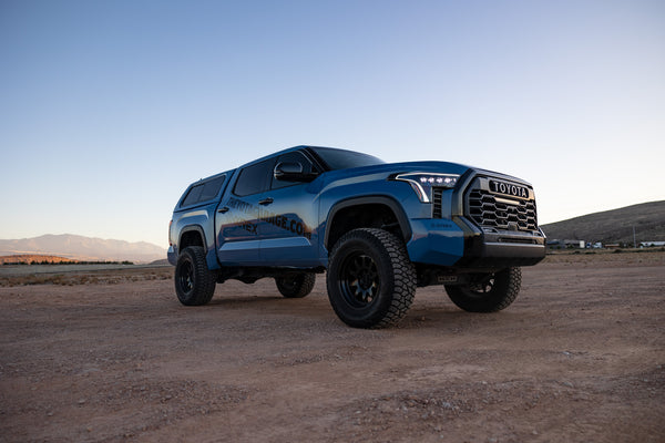 theyotagarage 2022 toyota tundra cavalry blue with 6inch lift and 37" tires with method race wheels