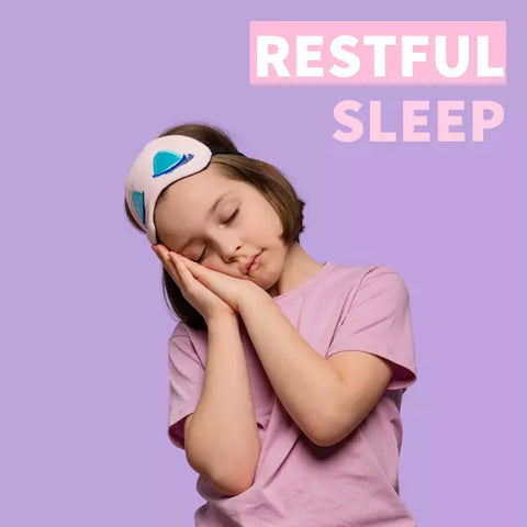 Child sleeping with a banner that reads' restful sleep' on a purple background