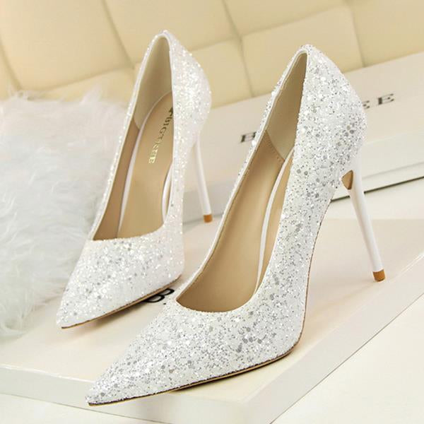 white sequin pumps