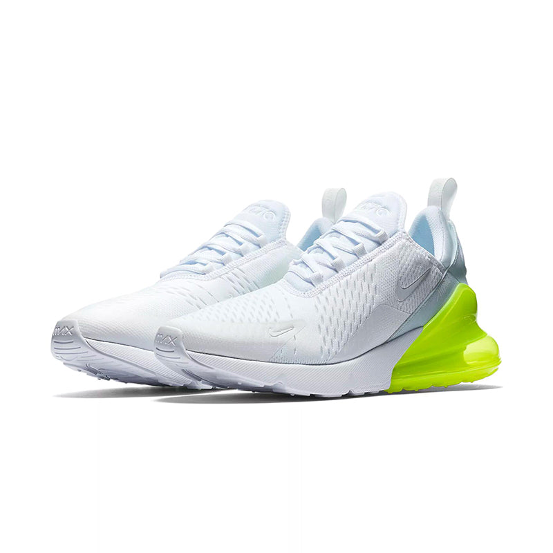 white and neon nike shoes