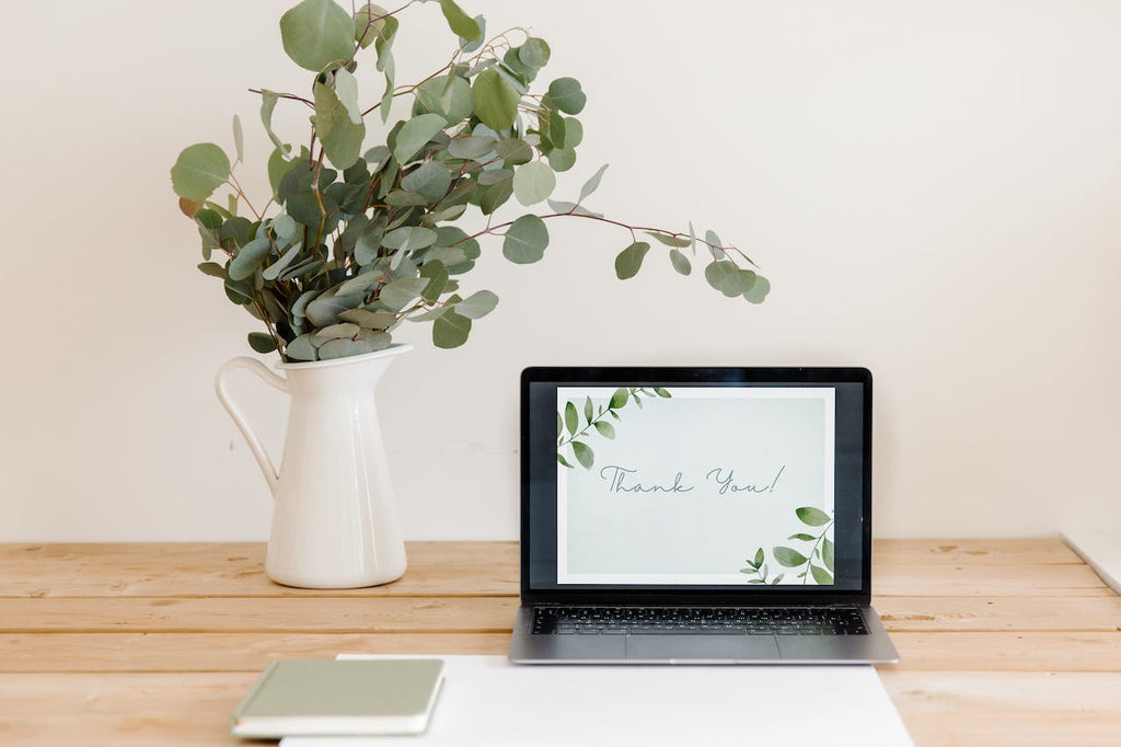 A Thank You note written on a laptop screen