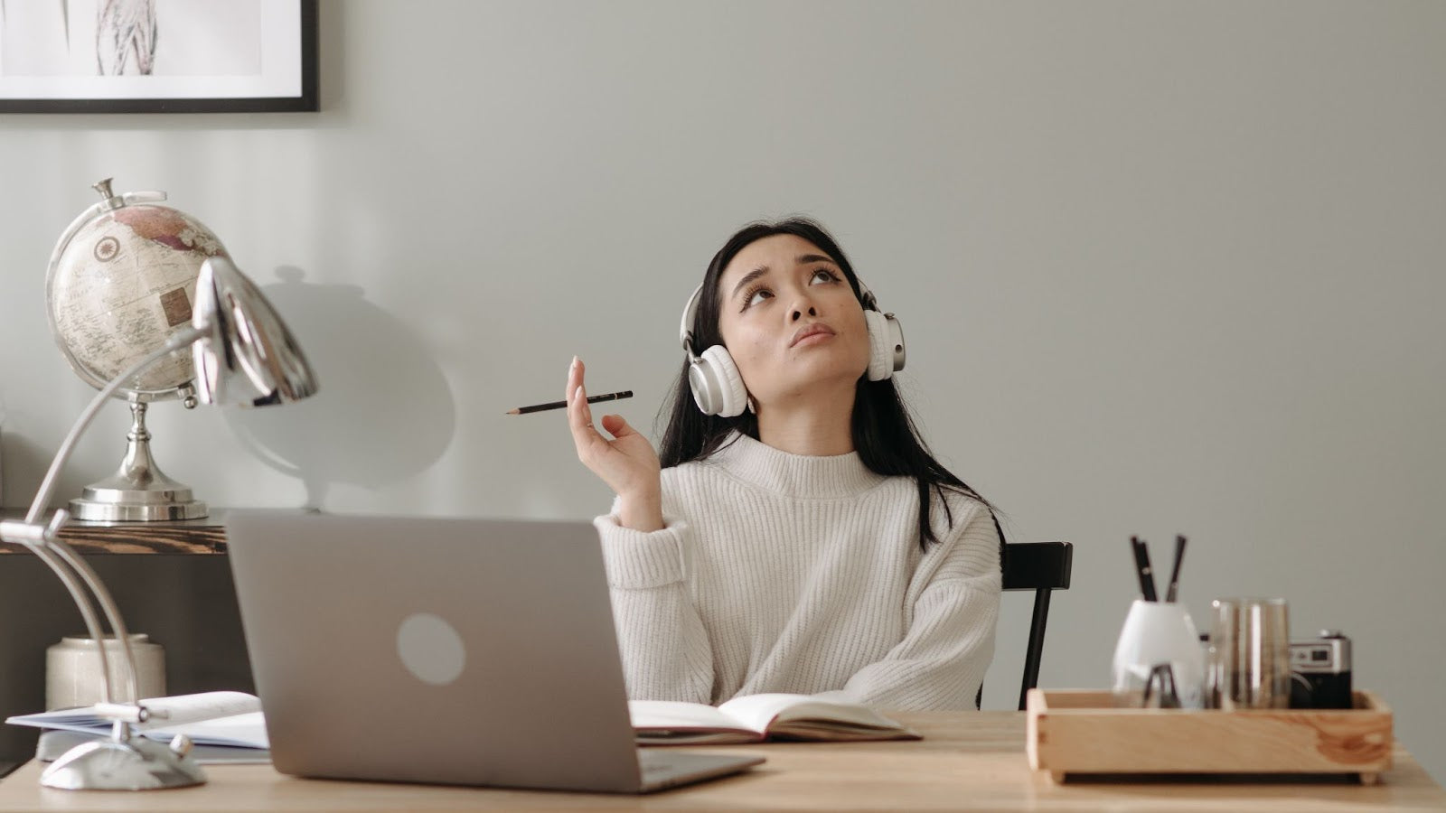 Why AB Testing Matters? -- A woman looking upwards seemingly thinking about something